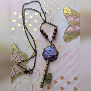 Handmade purple fluid art key pendant